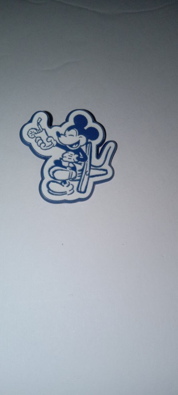 Disney mickey booster pin.